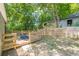 Charming backyard with a deck and a wooden fence, creating a private retreat at 299 Fletcher Street Sw, Atlanta, GA 30315