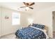 Bedroom features neutral walls, luxury vinyl plank flooring, and a ceiling fan at 299 Fletcher Street Sw, Atlanta, GA 30315