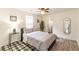 Bedroom features a ceiling fan, wood flooring, and a neutral color palette at 299 Fletcher Street Sw, Atlanta, GA 30315