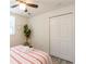 Bedroom featuring luxury vinyl plank flooring, closet with white doors, and a ceiling fan at 299 Fletcher Street Sw, Atlanta, GA 30315