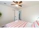 Bedroom featuring luxury vinyl plank flooring, closet with white doors, and a ceiling fan at 299 Fletcher Street Sw, Atlanta, GA 30315