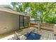 Outdoor deck with patio table and chairs, perfect for relaxing and entertaining at 299 Fletcher Street Sw, Atlanta, GA 30315