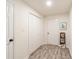 Hallway featuring luxury vinyl plank flooring, closet and neutral walls at 299 Fletcher Street Sw, Atlanta, GA 30315