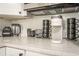 Clean and organized kitchen counter featuring modern appliances and stylish decor at 299 Fletcher Street Sw, Atlanta, GA 30315