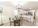 Modern kitchen with stainless steel appliances, sleek white cabinetry, and an island with bar seating at 299 Fletcher Street Sw, Atlanta, GA 30315