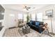 Cozy living room with stylish furniture, hardwood floors, and plenty of natural light at 299 Fletcher Street Sw, Atlanta, GA 30315