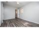 This bedroom features a ceiling fan and wood floors at 5042 Central Church Rd, Douglasville, GA 30135