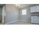 Bright dining area with modern lighting fixtures, perfect for Gathering meals and entertaining guests at 5042 Central Church Rd, Douglasville, GA 30135