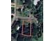 A bird's-eye view of the property in a tree-lined neighborhood at the end of a quiet cul-de-sac at 17 Wildflower Cv, Carrollton, GA 30116