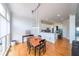 Bright dining area adjacent to kitchen with hardwood floors and natural light at 2476 Manor Walk, Decatur, GA 30030