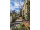 Elegant front gate with stone steps leading to a beautifully landscaped yard and charming walkway at 81 Delmont Ne Dr, Atlanta, GA 30305
