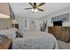 Stylish bedroom featuring a TV, an ensuite bathroom, and comfortable furnishings at 2113 N Landing Way, Marietta, GA 30066