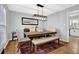 Dining room with modern lighting, hardwood floors, and a cozy rug at 2113 N Landing Way, Marietta, GA 30066