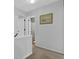 Upstairs hallway with carpet and doors to the bathroom and bedrooms at 2113 N Landing Way, Marietta, GA 30066