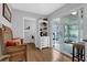 Inviting living room area with natural light, cozy seating, and access to a sunroom at 2113 N Landing Way, Marietta, GA 30066