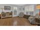 Cozy living room with hardwood floors, armchairs and natural light at 2113 N Landing Way, Marietta, GA 30066