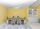 Dining room featuring a built-in display cabinet and a ceiling fan at 2201 Chase Se Way, Conyers, GA 30013