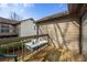 This outdoor balcony features wooden floors and a table for dining outside at 30 Finch Ne Trl, Atlanta, GA 30308