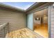 View from balcony into the living space with light hardwood floors at 30 Finch Ne Trl, Atlanta, GA 30308