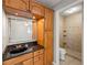 En Suite bathroom features vanity with solid surface countertop and step in shower at 30 Finch Ne Trl, Atlanta, GA 30308