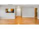 Elegant living room with hardwood floors and an opening to the kitchen; bright and inviting at 30 Finch Ne Trl, Atlanta, GA 30308