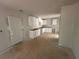 Unfinished kitchen featuring white cabinets and open layout ready for appliances and customizations at 30 Yellow Brick Way, Covington, GA 30014