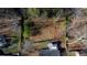 An overhead aerial view of the backyard, home, and surrounding area at 383 Oakridge Se Dr, Cartersville, GA 30121