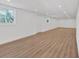 Bright, finished basement featuring new floors, recessed lighting, and natural light from the windows at 383 Oakridge Se Dr, Cartersville, GA 30121