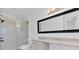 Renovated bathroom with a glass-enclosed shower, granite countertop, and modern fixtures at 383 Oakridge Se Dr, Cartersville, GA 30121
