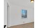 Bright bedroom showcasing hardwood floors and a sunny window creating a calming atmosphere at 383 Oakridge Se Dr, Cartersville, GA 30121