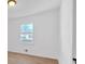 Light filled bedroom features hardwood floors and a sunny window creating a calming atmosphere at 383 Oakridge Se Dr, Cartersville, GA 30121