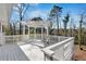 Covered outdoor deck with white wood pergola and railing at 383 Oakridge Se Dr, Cartersville, GA 30121