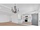 Spacious living room and kitchen with stylish lighting and modern stainless steel appliances, perfect for gatherings at 383 Oakridge Se Dr, Cartersville, GA 30121