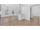 Open-concept area of the living room, seamlessly connecting the kitchen and entry, creating an inviting atmosphere at 383 Oakridge Se Dr, Cartersville, GA 30121