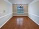 Traditional dining room with hardwood floors and elegant chandelier at 45 Fiddle Crk, Social Circle, GA 30025