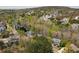Neighborhood aerial view showcasing homes nestled in a wooded setting, providing privacy at 102 Stargaze Rdg, Canton, GA 30114