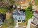 Aerial view showcases the layout of the home, backyard features, and surrounding landscaping at 102 Stargaze Rdg, Canton, GA 30114
