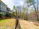 Expansive backyard features a hot tub, playset, and ample space for recreation and relaxation at 102 Stargaze Rdg, Canton, GA 30114