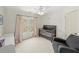 Bedroom with ceiling fan, bassinet, and windows for natural light at 102 Stargaze Rdg, Canton, GA 30114