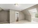 Bedroom with neutral color scheme, dormer window, carpet and an entry into the bathroom at 102 Stargaze Rdg, Canton, GA 30114