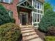 Stone steps lead to the inviting covered front porch and front door of this charming home at 102 Stargaze Rdg, Canton, GA 30114