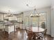 Eat-in kitchen features island and stainless steel appliances at 102 Stargaze Rdg, Canton, GA 30114