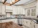 Renovated kitchen boasts granite countertops and backsplash at 102 Stargaze Rdg, Canton, GA 30114