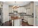 Stylish kitchen includes granite counters and custom cabinets at 102 Stargaze Rdg, Canton, GA 30114