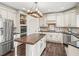 Open kitchen features stainless appliances and a center island at 102 Stargaze Rdg, Canton, GA 30114