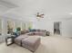 Spacious living room with tray ceilings, natural lighting, and comfortable furniture at 102 Stargaze Rdg, Canton, GA 30114