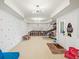 Spacious playroom with colorful polka dots on the wall and a variety of fun activities at 102 Stargaze Rdg, Canton, GA 30114