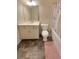 Updated bathroom with stylish vanity, modern fixtures, and a shower-tub combo at 1125 Campbell Pine Trl, Lawrenceville, GA 30045