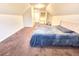 Spacious carpeted bedroom featuring a cozy layout, and neutral-toned walls at 1125 Campbell Pine Trl, Lawrenceville, GA 30045