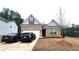 Inviting brick facade with a two-car garage and tidy landscaping enhance curb appeal at 1125 Campbell Pine Trl, Lawrenceville, GA 30045